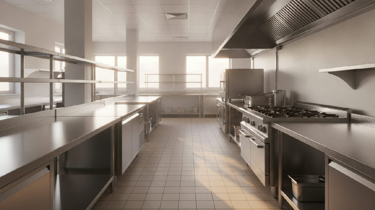 Cuisine de restaurant propre et sèche après le nettoyage de nuit, comptoirs en inox brillants et plancher dégraissé prêt pour l'inspection